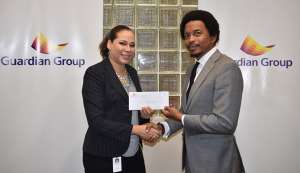 MEANINGFUL CONTRIBUTION: TTOC president Brian Lewis, right, receives a cheque from Guardian Group’s senior manager – Group Corporate Communications, Ayesha Boucaud-Claxton, to aid the TTOC’s #10golds24 Athlete Welfare and Preparation Fund at the company’s headquarters at Columbus Circle, Westmoorings, last Friday. MEANINGFUL CONTRIBUTION: TTOC president Brian Lewis, right, receives a cheque from Guardian Group’s senior manager – Group Corporate Communications, Ayesha Boucaud-Claxton, to aid the TTOC’s #10golds24 Athlete Welfare and Preparation Fund at the company’s headquarters at Columbus Circle, Westmoorings, last Friday.