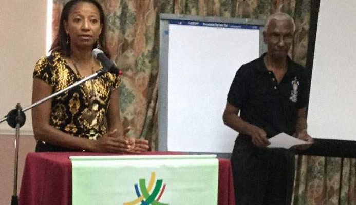 UWI PRESENTATION: University of the West Indies lecturer Sherlan Cabralis, left, makes a presentation during Saturday’s First Citizens Sports Foundation National Governing Bodies (NGBs) Meet and Greet Seminar, at the Cascadia Hotel and Conference Centre. At right is senior Sports Foundation member, Dr Terry Ali.
