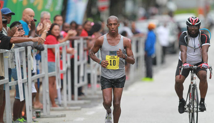 Curtis Cox heads to the finish-line. He was the first T&T runner to finish in a time of 2:53:43 out at the Queen’s Park Savannah, Port-of-Spain, yesterday.