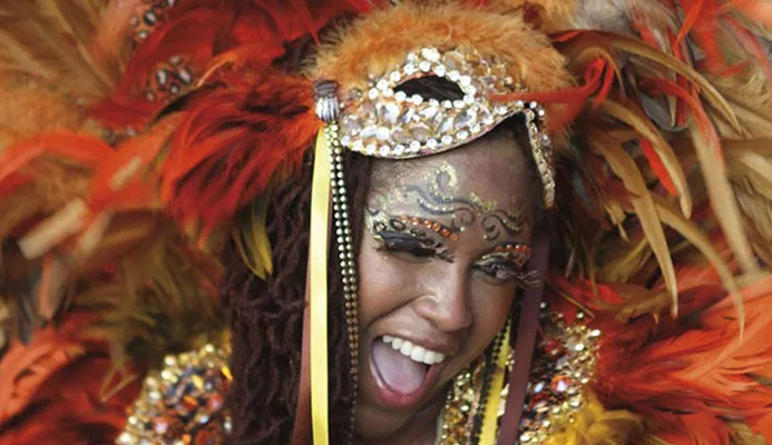 A sassy Trinidad Carnival masquerader in costume. Photo by Stephen Broadbridge