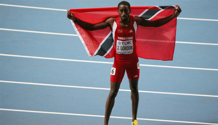 Trinidad and Tobago's Jehue Gordon celebrates winning the world 400m hurdles title in 2013 at the end of a season when he had had a physical imbalance identified and rectified by MJP staff ©Getty Images