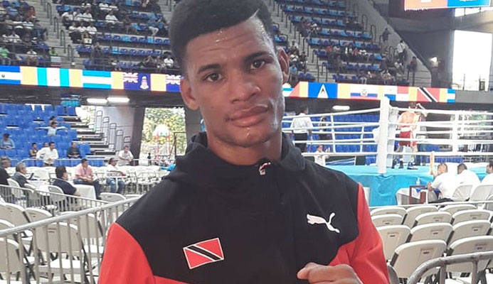 Boxer Michael Alexander earned T&T’s first medal at the Pan Am Games, a bronze, on Tuesday night.