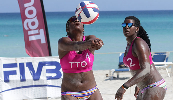 T&T’s Malika Davidson tries to play a pass to team-mate Rheeza Grant during one of their women’s matches on the fourth stop of the NORCECA Beach Circuit in the sands adjacent to the Barcelo Solymar Hotel, Varadero, Cuba in May