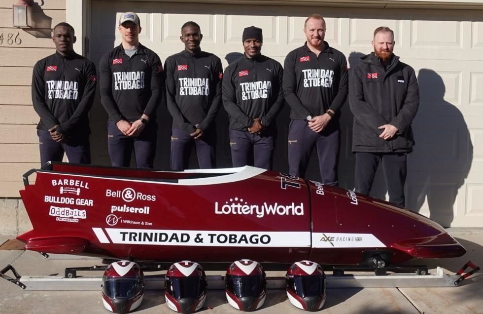 T&T bobsled men's team Shakeel John, from left, Thomas Harris, Shomari John, Andre Marcano and Axel Browne along with staff member Lewis Prentice is in favorable position to qualify for Olympic Games in France.