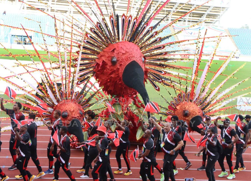 Team Trinidad & Tobago dance at the opening ceremony of the 17th Commonwealth Games, Hasely Crawford Stadium, Port of Spain on Friday. - Photo by Angelo Marcelle (Image obtained at newsday.co.tt)