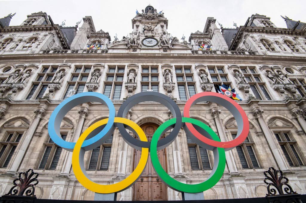 This general view shows the Olympic rings on display in front of The City Hall in Paris on March 13 ahead of the 2024 Olympic Games. - (AFP PHOTO) (Image obtained at newsday.co.tt)