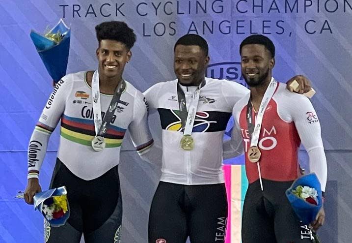 Pan American Track Cycling Championships 2024 men's keirin gold medallist Nicholas Paul, centre, is flanked by silver medallist and reigning keirin world champion Kevin Quintero, left, and bronze medallist Kwesi Browne. Photo courtesy TT Cycling Federation. - (Image obtained at newsday.co.tt)